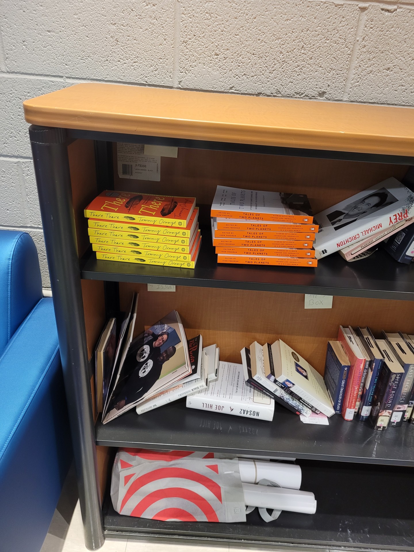 A picture of the end shelf early in the year, just starting to get filled in with books.