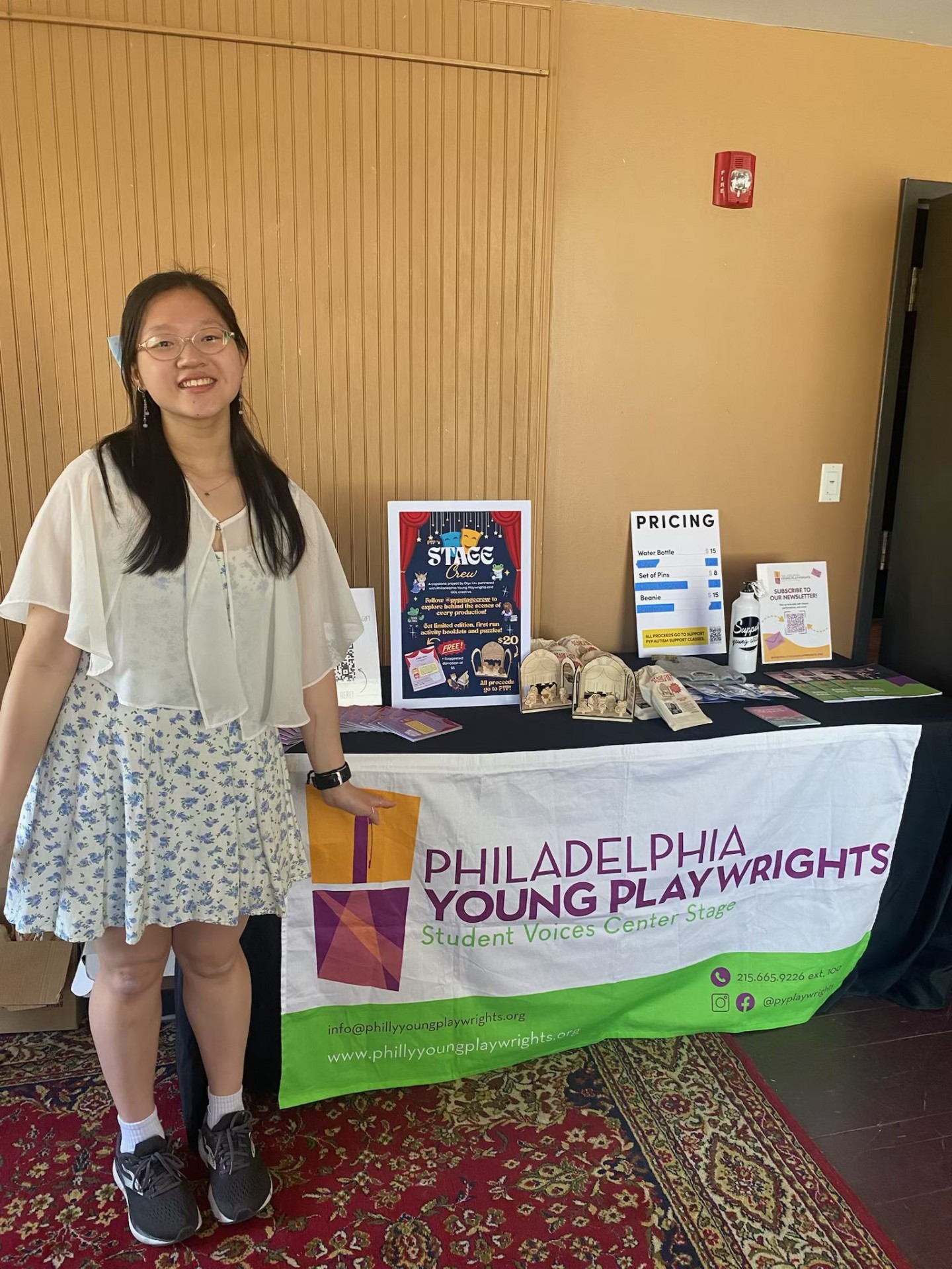 Posing with the Table at SaturPLAY! The leaflets were free with a suggested $5 donation and the puzzles were $20.
