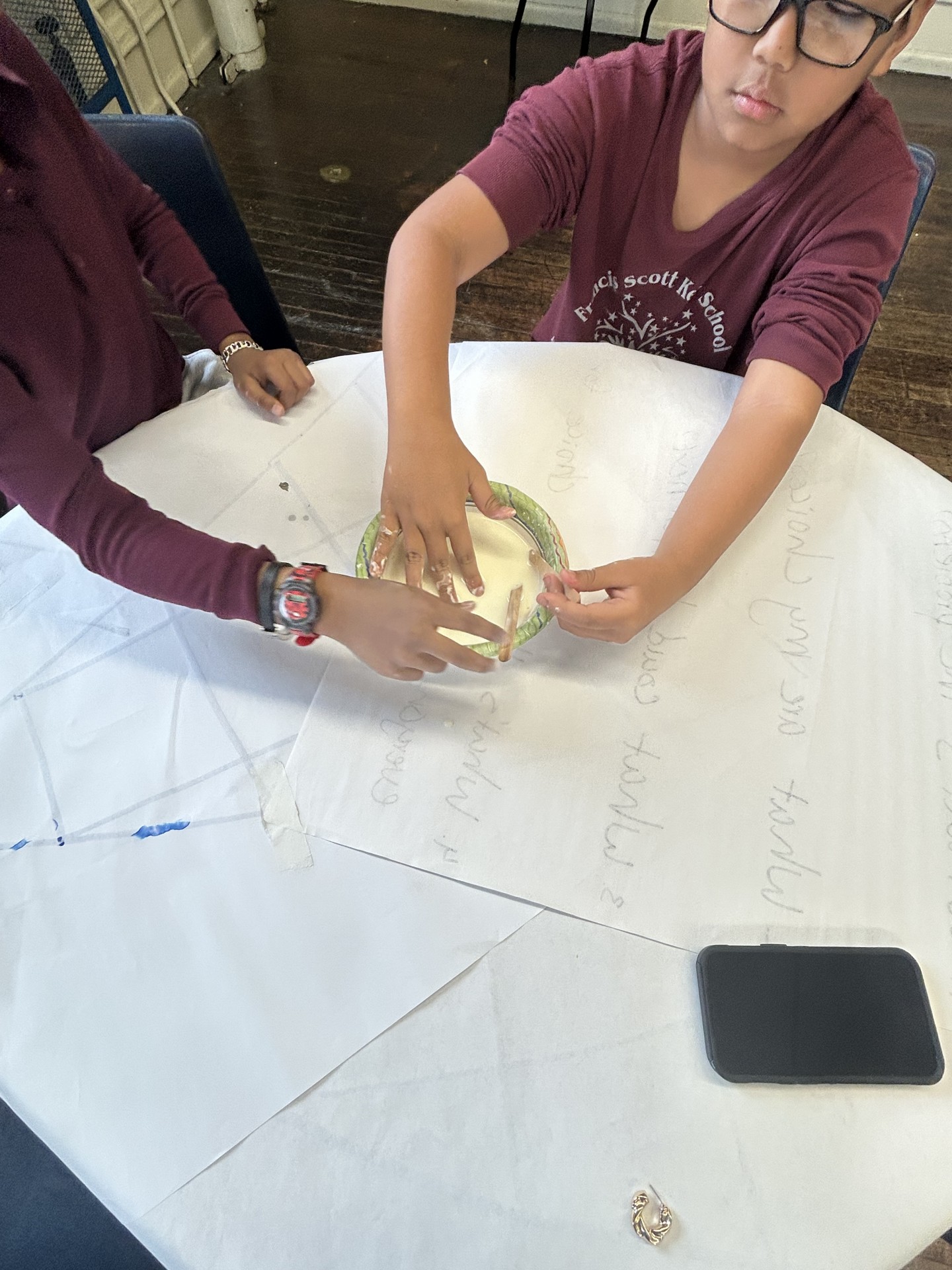 (Day 3) Students learning about oobleck and playing with it!