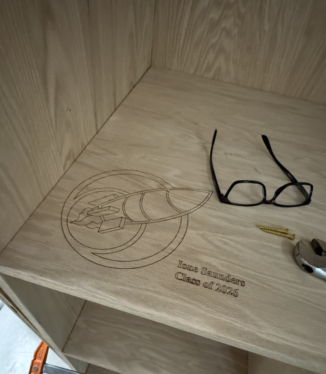 Laser-cut, hand-drawn design.